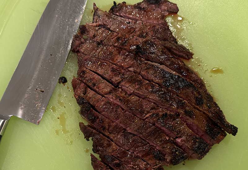 Flap steak cut across the grain